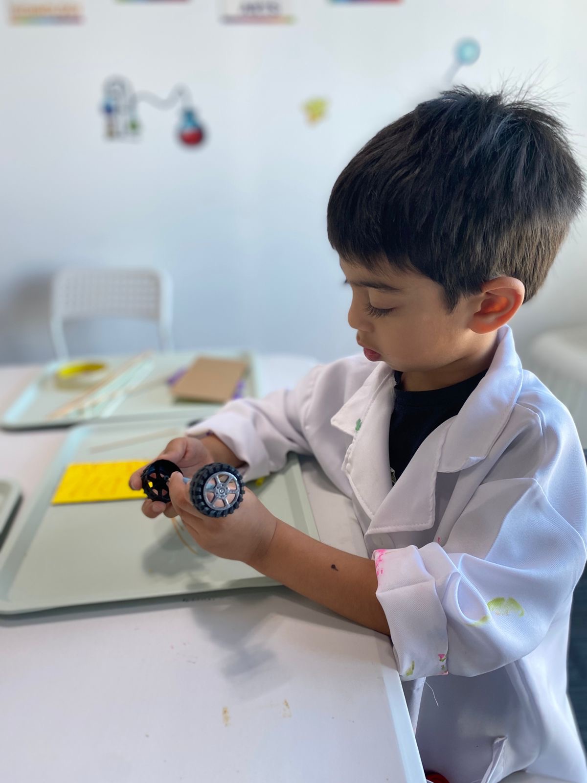 A child exploring an engineering build at Kids WHYverse